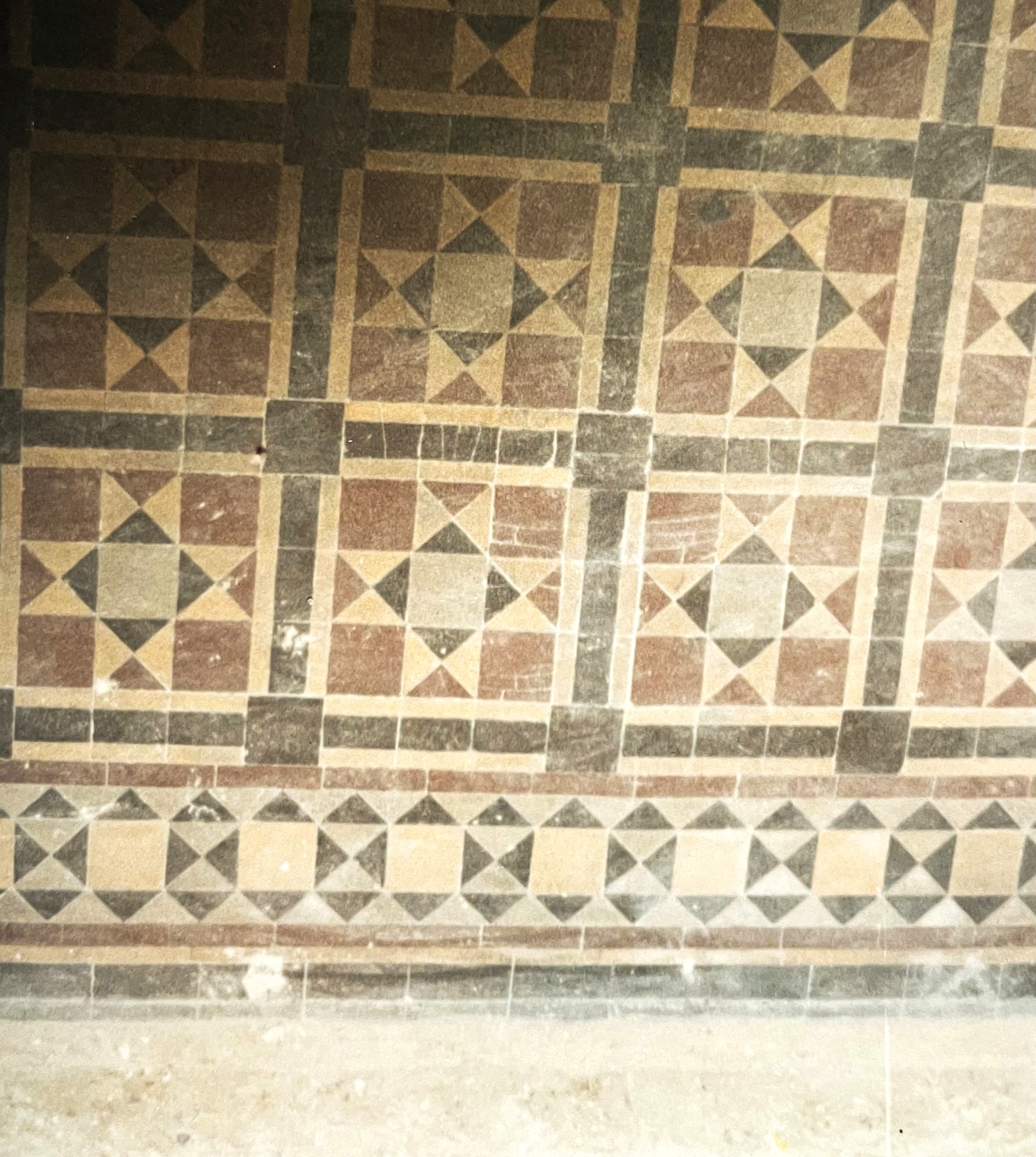 Original patterned tiles in the front hall